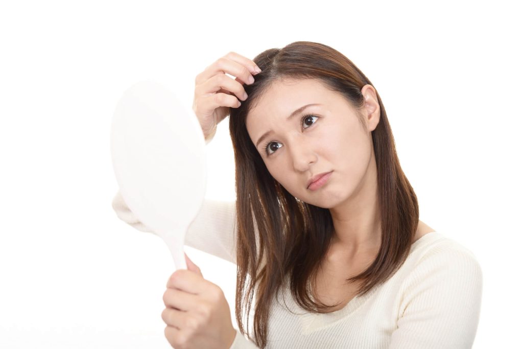 掉髮的女人