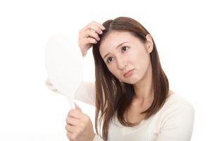 掉髮的女人